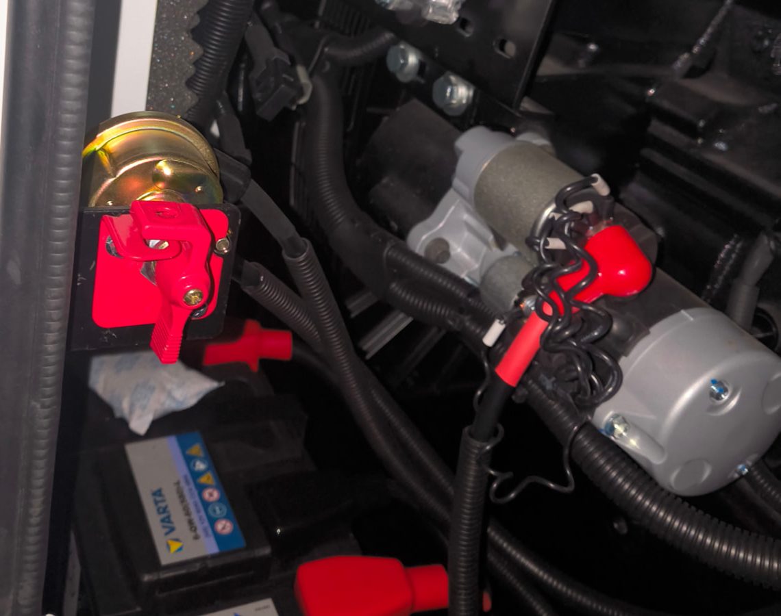 Battery isolator switch and batteries