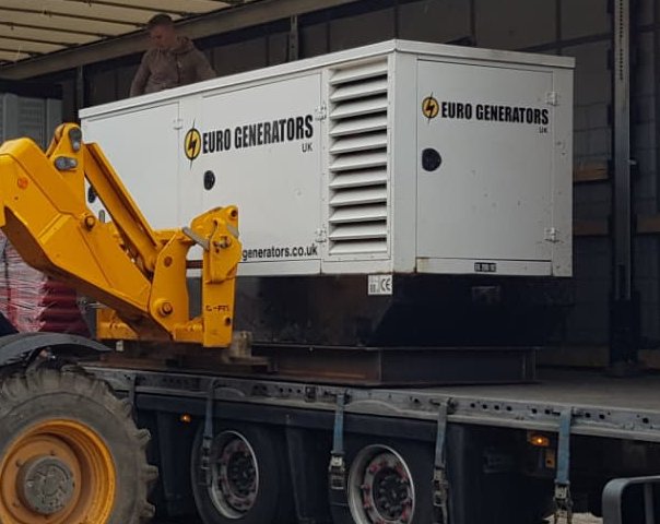 Silent set being loaded onto a lorry by telehandler