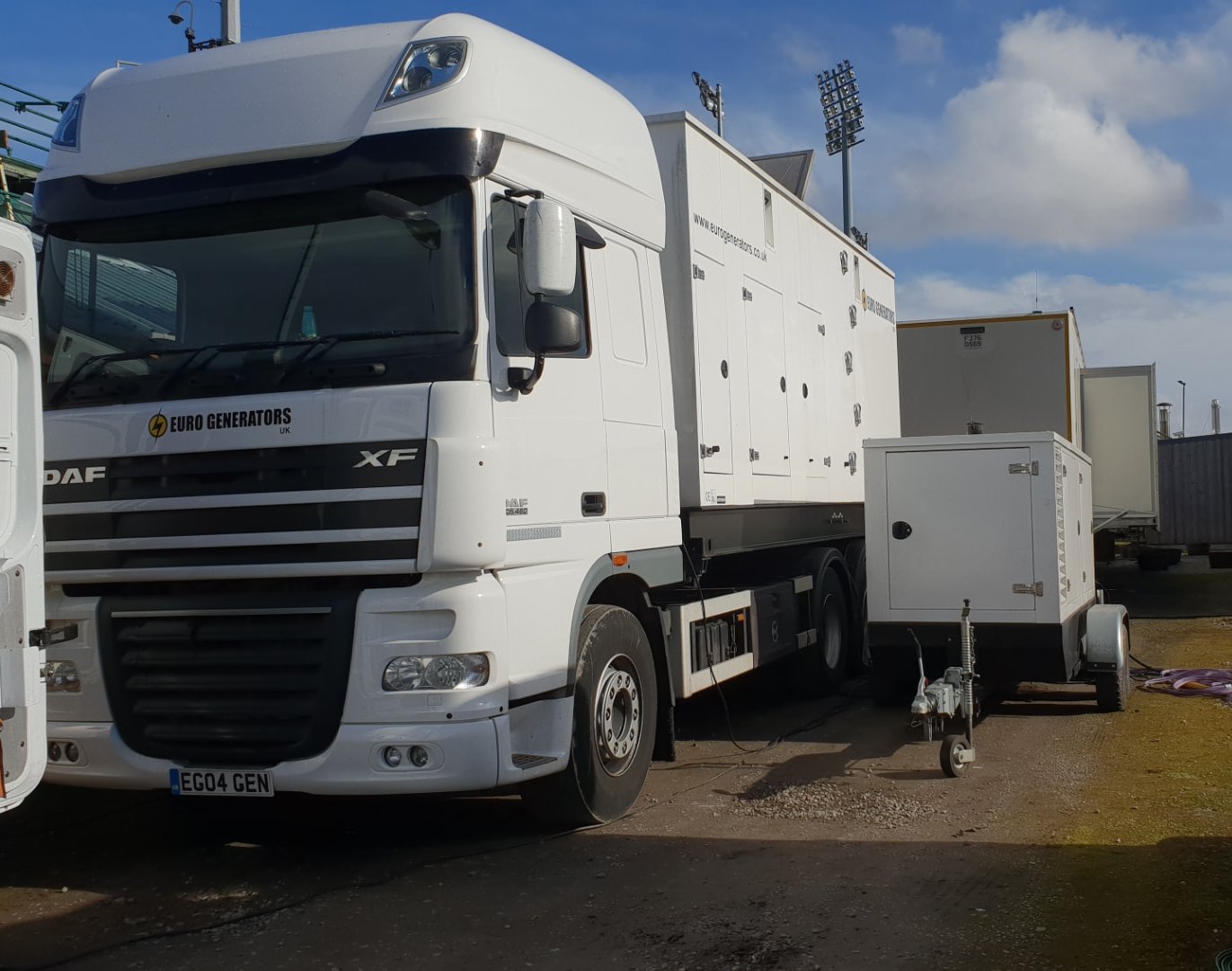 Lorry-mounted Euro Generators set and trailer set at a stadium